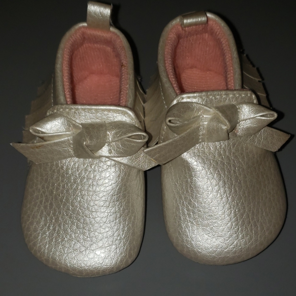 Gold/champagne colored moccasins for baby girl!